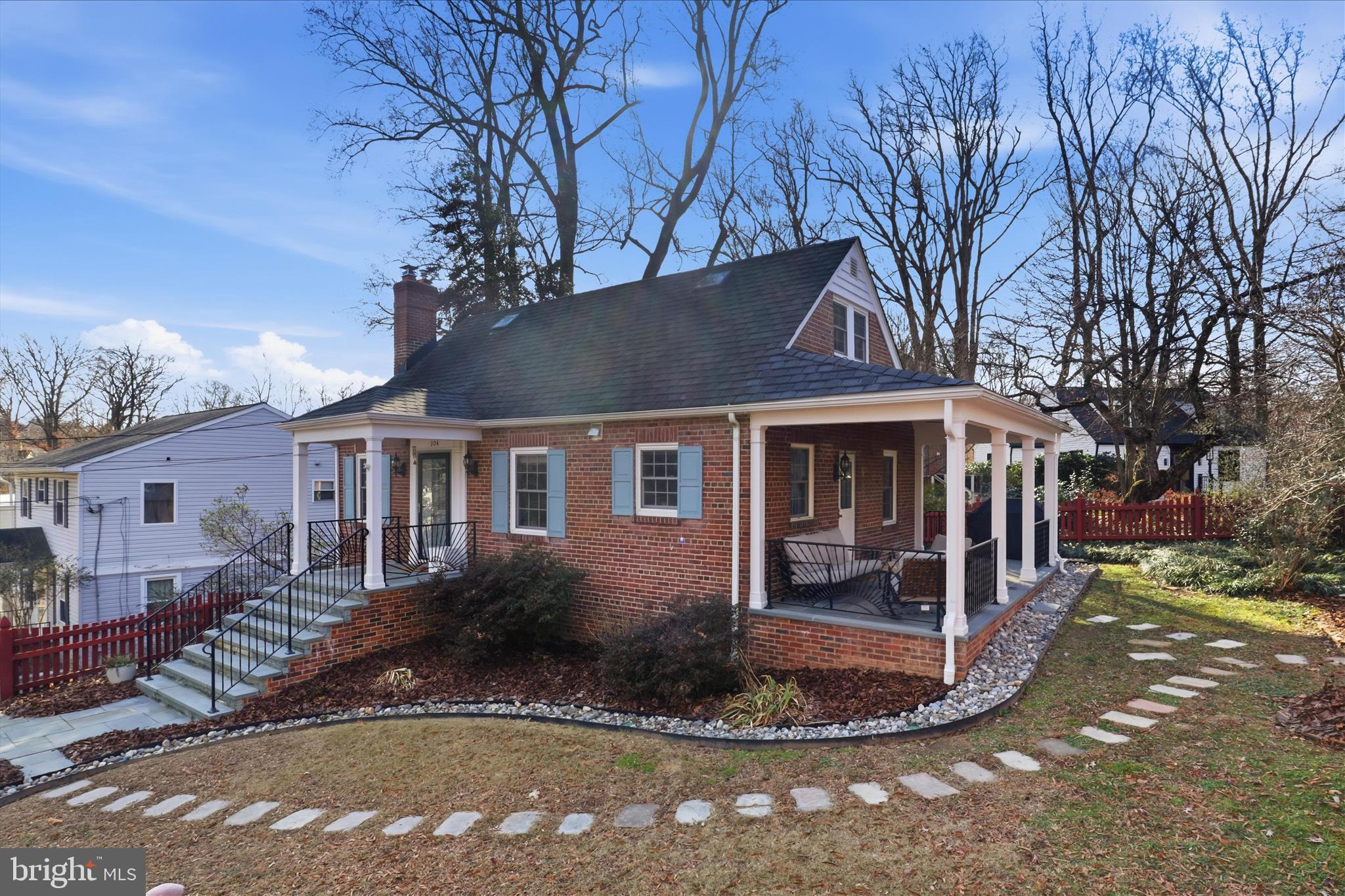 304 Highview Avenue Silver Spring, MD 20901 - Photo 6 of 48 a front view of a house with a yard