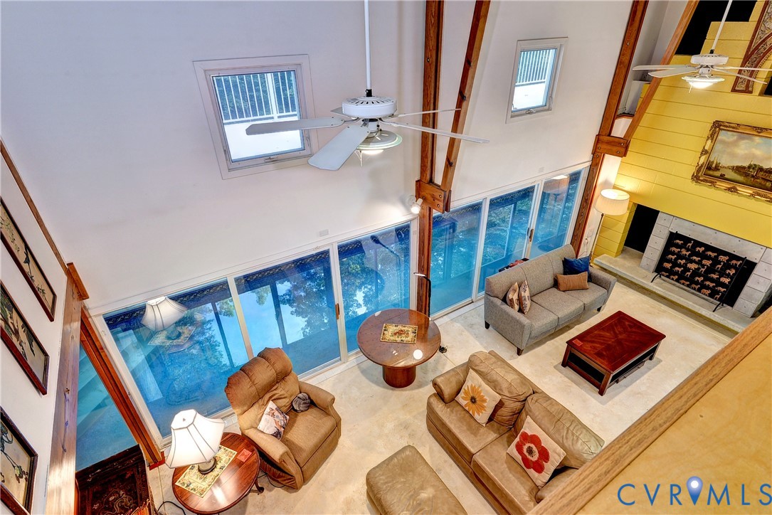 8615 Historical Path Road New Kent, VA 23124 - Photo 2 of 50 a living room with furniture and a rug