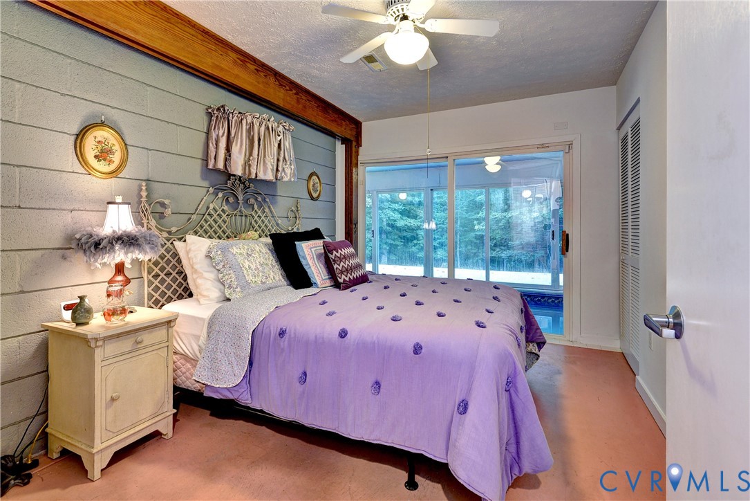 8615 Historical Path Road New Kent, VA 23124 - Photo 29 of 50 a bedroom with a bed and window