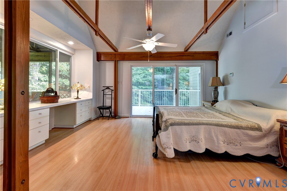 8615 Historical Path Road New Kent, VA 23124 - Photo 40 of 50 a bedroom with a bed and wooden floor