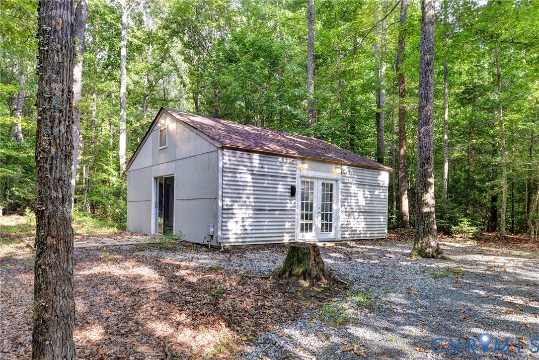 8615 Historical Path Road New Kent, VA 23124 - Photo 46 of 50 a view of a house with a yard