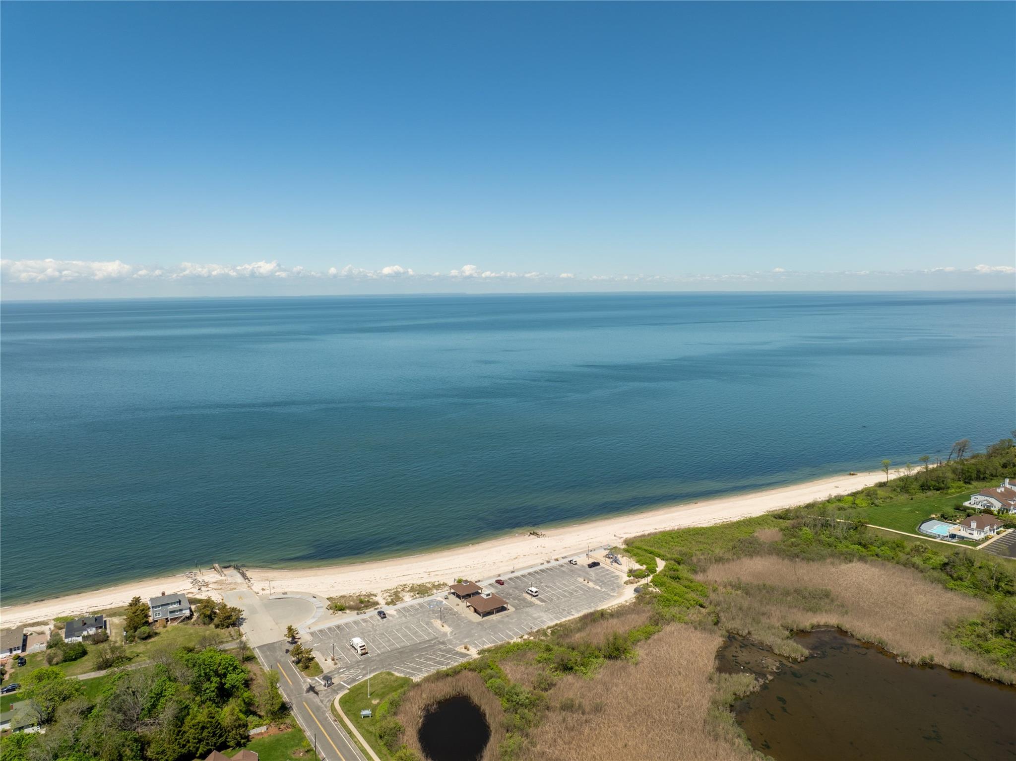 Pier Avenue Riverhead, NY 11901 - Photo 4 of 18 a view of an ocean beach