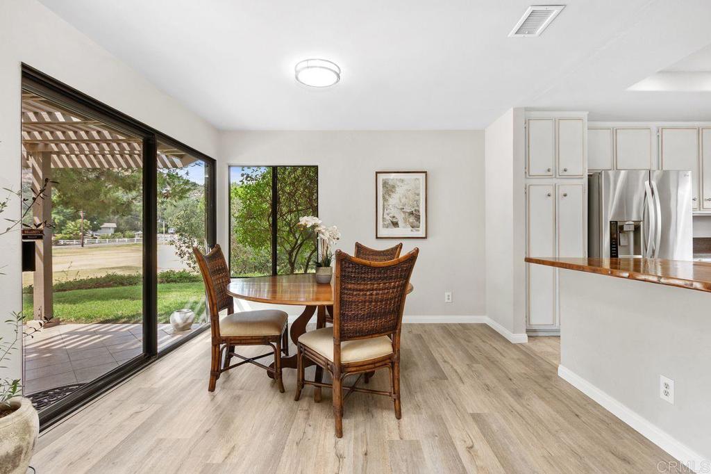 4119 Oak Island Lane Fallbrook, CA 92028 - Photo 11 of 54 a living room with furniture and a large window