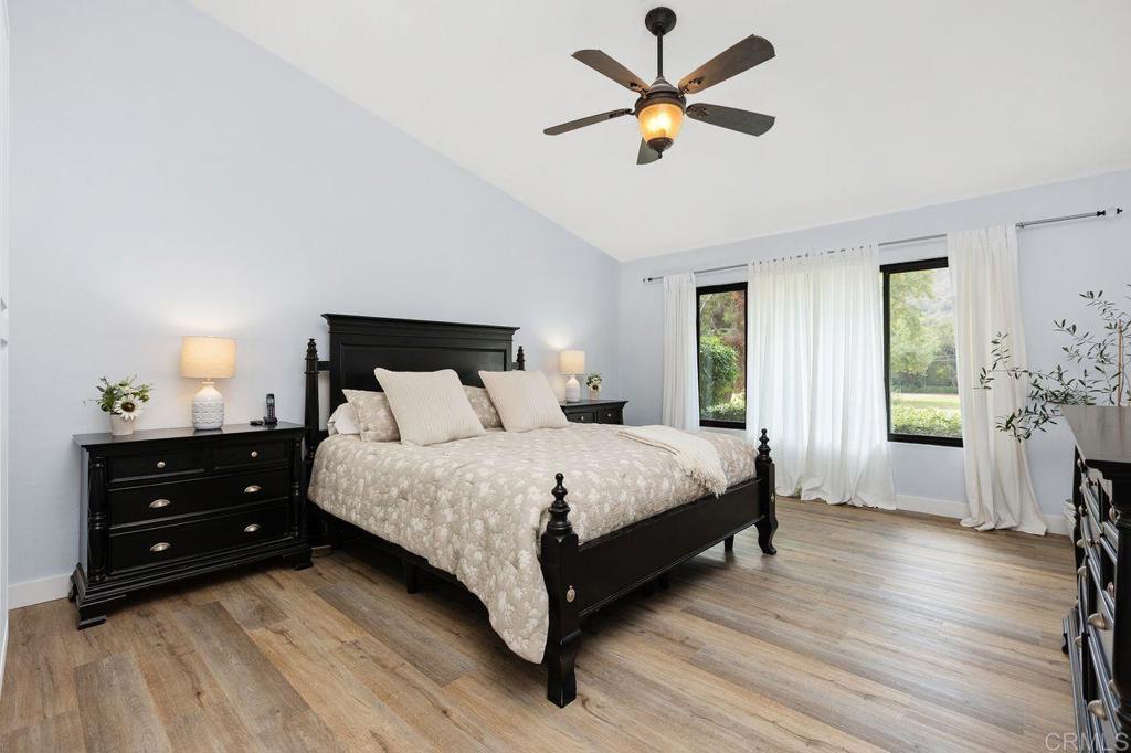4119 Oak Island Lane Fallbrook, CA 92028 - Photo 24 of 54 a bedroom with a bed and a window