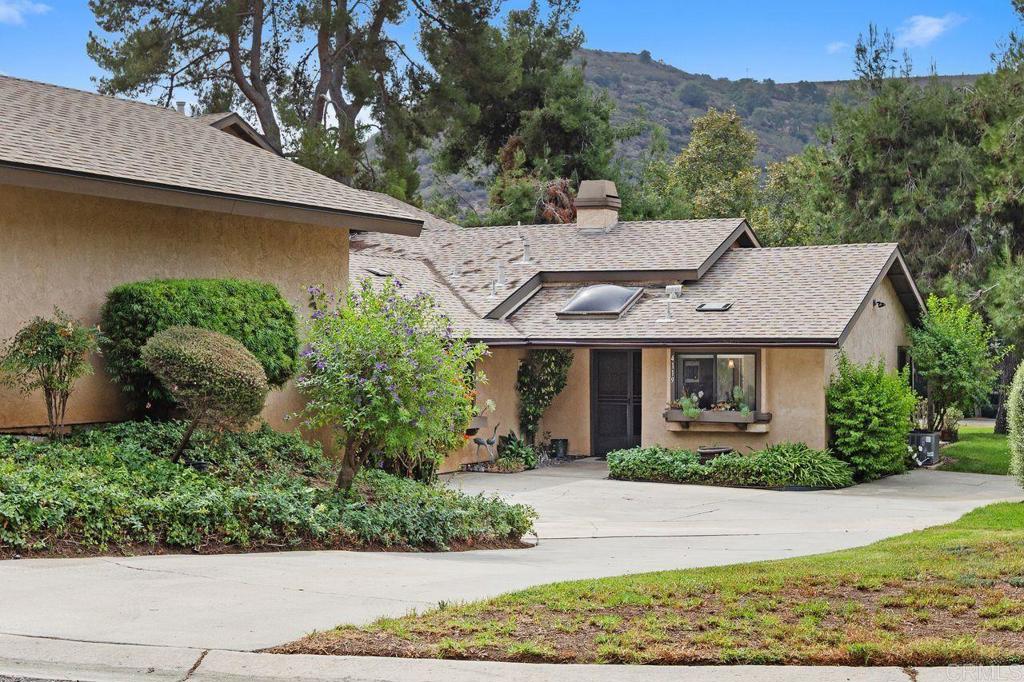 4119 Oak Island Lane Fallbrook, CA 92028 - Photo 3 of 54 front view of a house with a yard