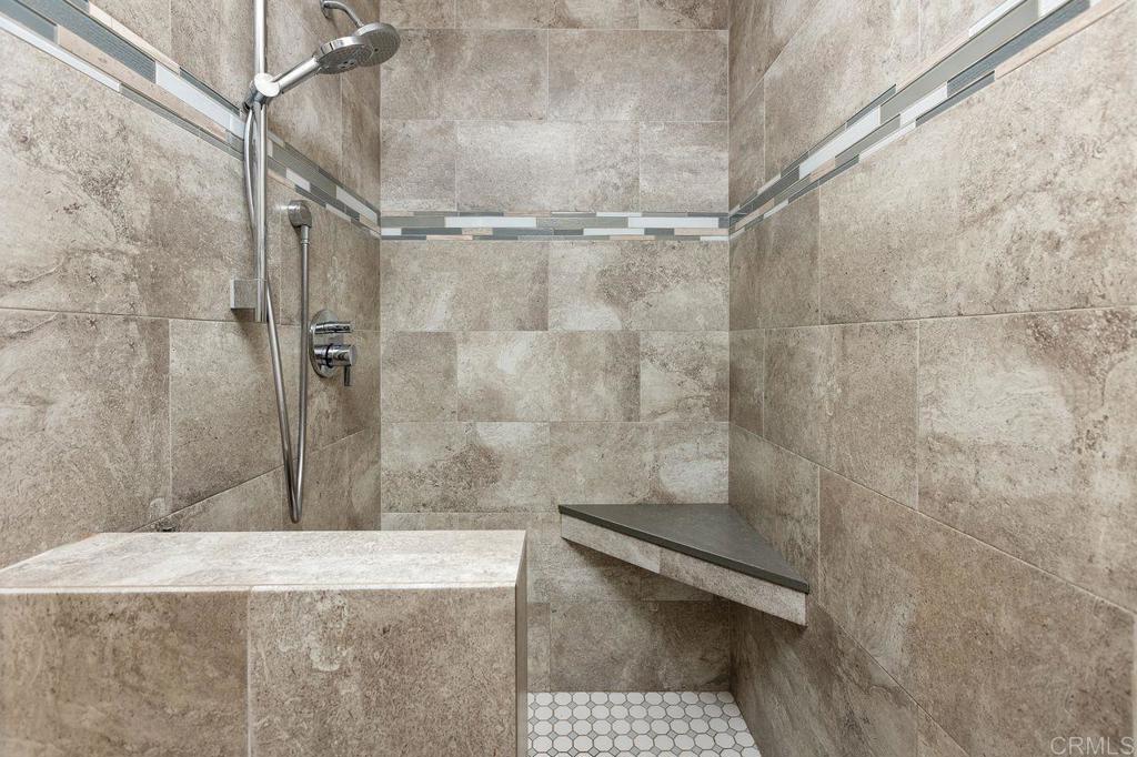 4119 Oak Island Lane Fallbrook, CA 92028 - Photo 32 of 54 a bathroom with a shower and a sink