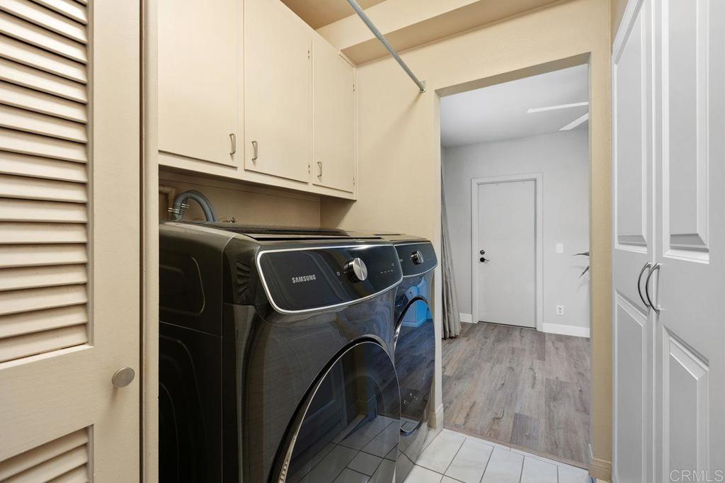 4119 Oak Island Lane Fallbrook, CA 92028 - Photo 33 of 54 a utility room with dryer and washer