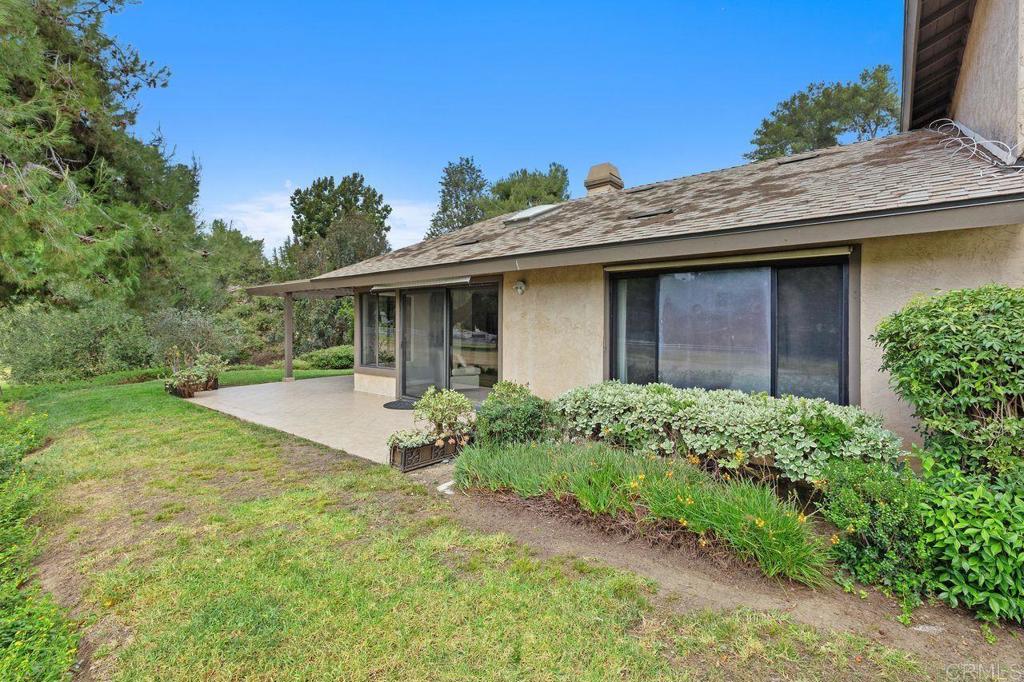 4119 Oak Island Lane Fallbrook, CA 92028 - Photo 41 of 54 a front view of a house with garden