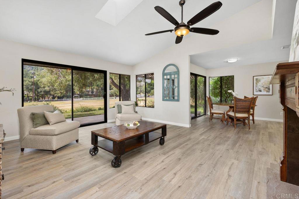 4119 Oak Island Lane Fallbrook, CA 92028 - Photo 7 of 54 a living room with furniture and a large window