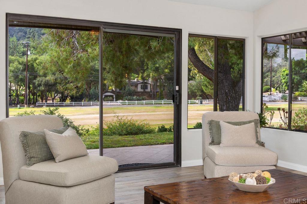 4119 Oak Island Lane Fallbrook, CA 92028 - Photo 8 of 54 a living room with couch and a large window