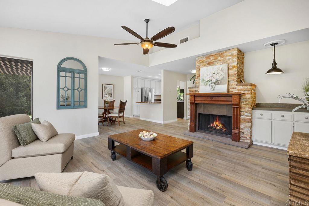 4119 Oak Island Lane Fallbrook, CA 92028 - Photo 9 of 54 a living room with furniture and a fireplace