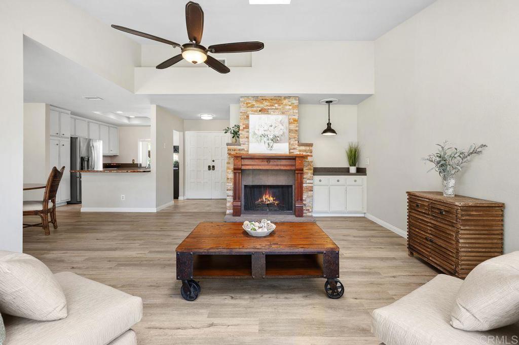 4119 Oak Island Lane Fallbrook, CA 92028 - Photo 10 of 54 a living room with furniture and a fireplace