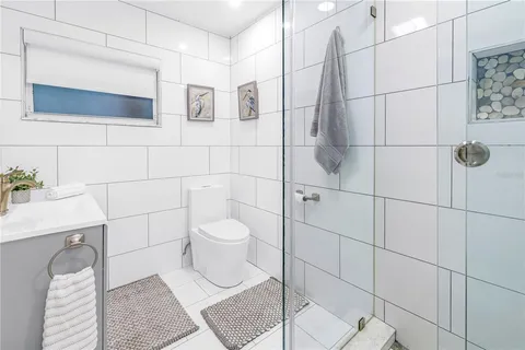 a bathroom with a sink and mirror