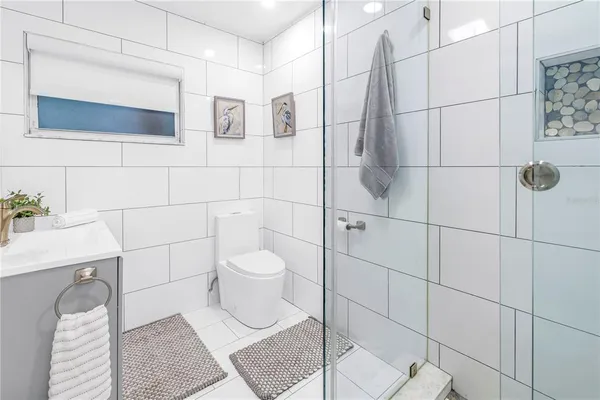 a bathroom with a sink and mirror