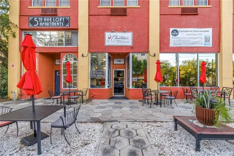 a view of a chair and table in the patio