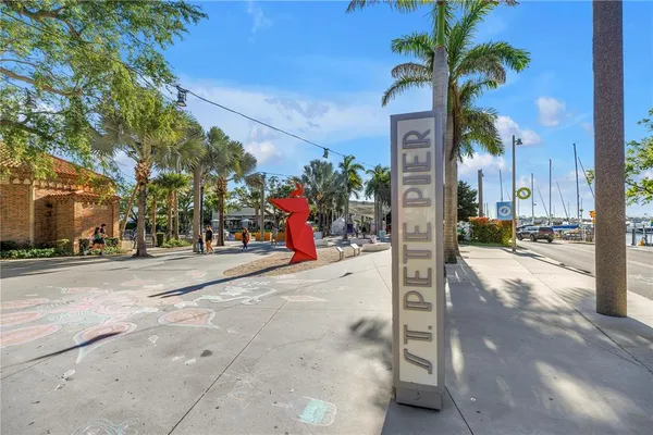 a front view of a house with a tree s