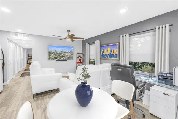 a living room with furniture and a window