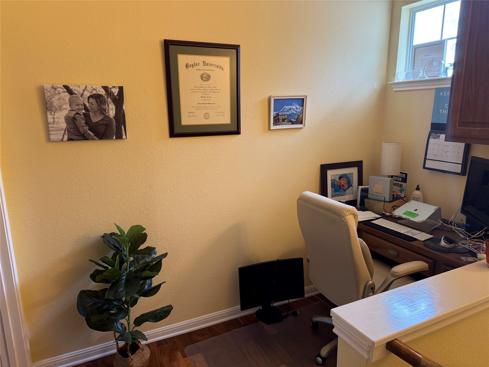 11000 Anderson Mill Road, Unit 93 Austin, TX 78750 - Photo 15 of 27 A well-lit, compact office space with wood flooring offers an ideal work-from-home setting.
