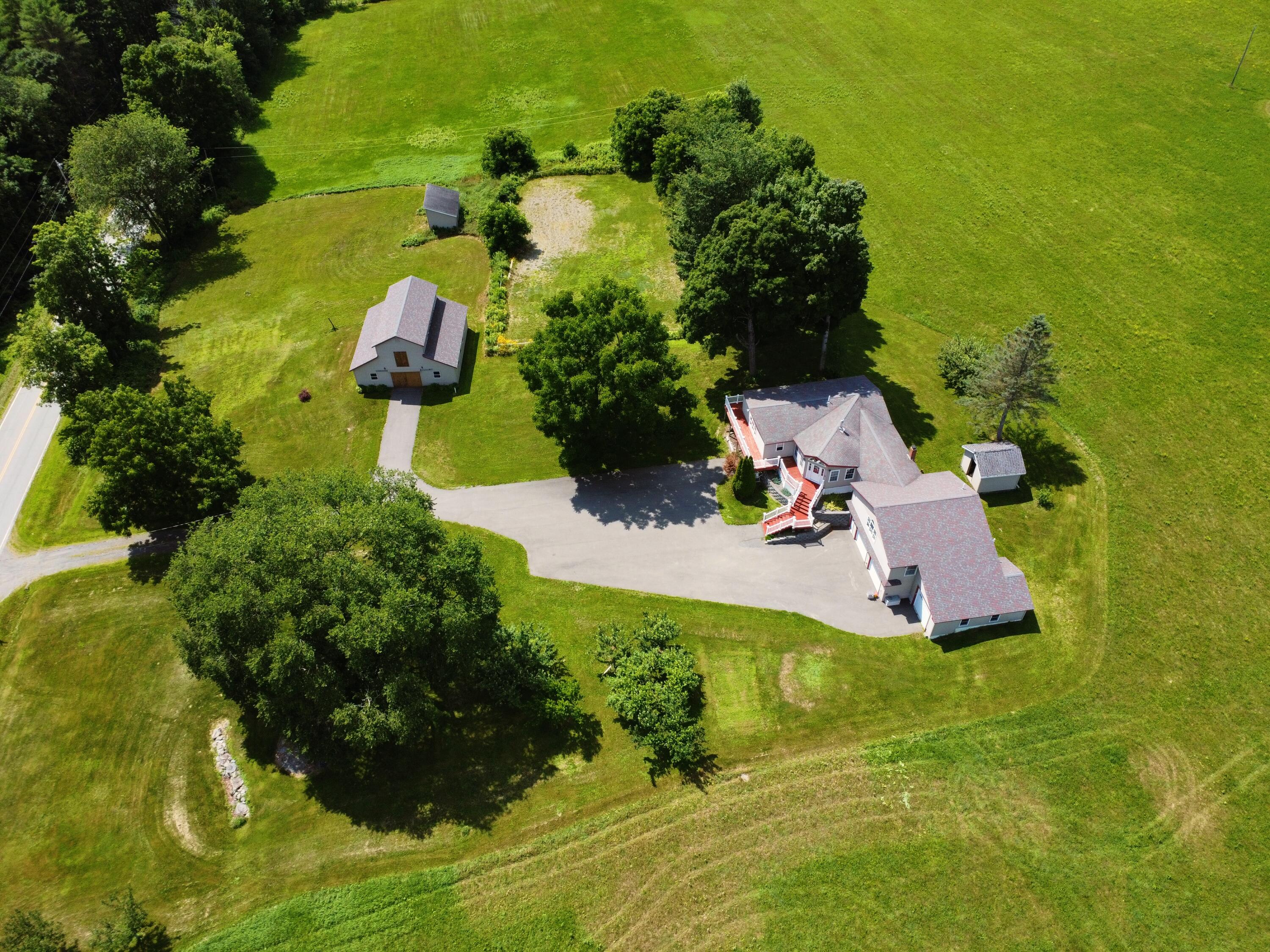 356 Range Road Dover Foxcroft, ME 04426 - Photo 19 of 58 LookingAcrossEntirePropertyHigher_DJI_03