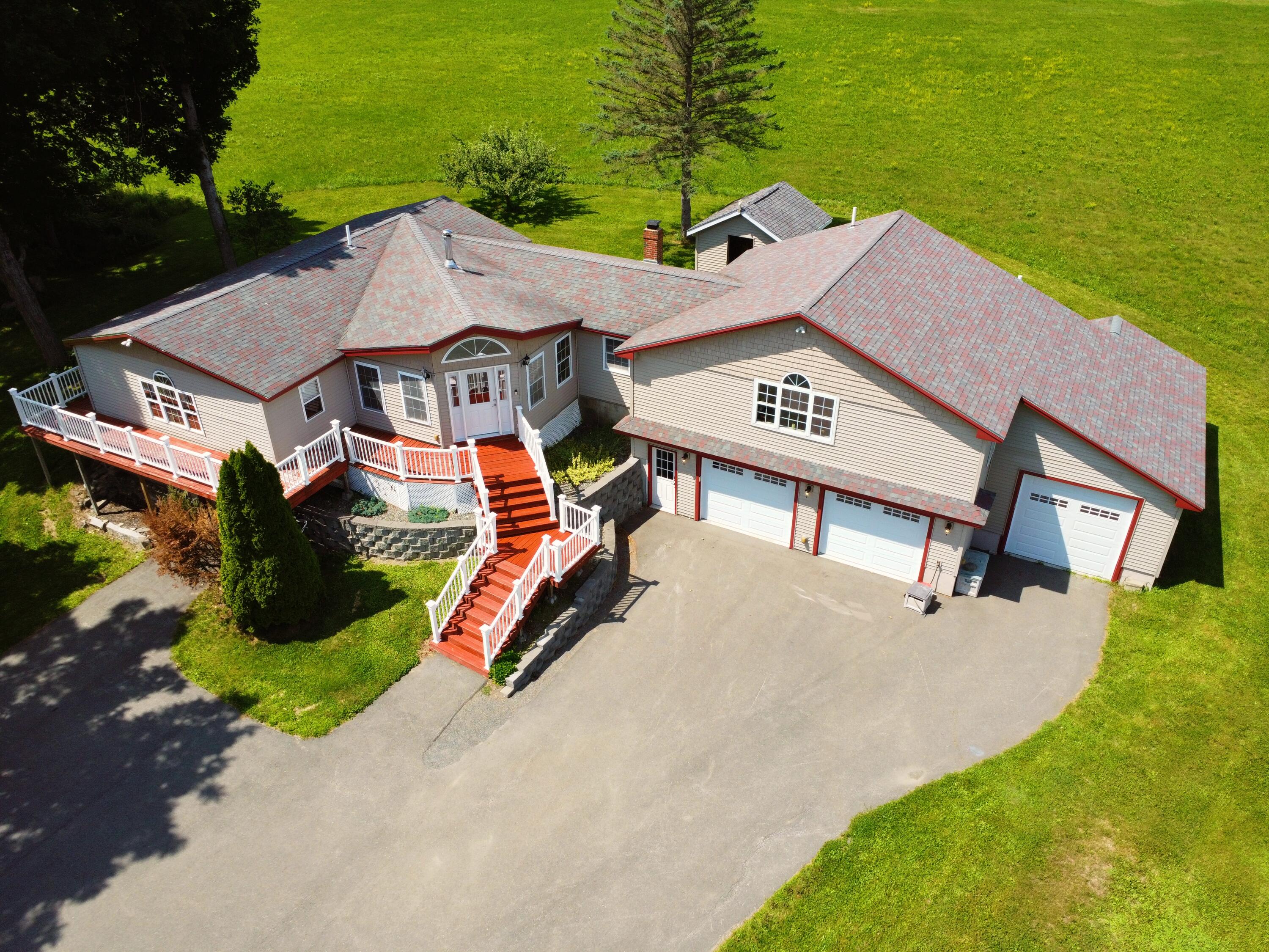 356 Range Road Dover-Foxcroft, ME 04426 - Photo 3 of 60 45DegreesAboveHouse_DJI_0352