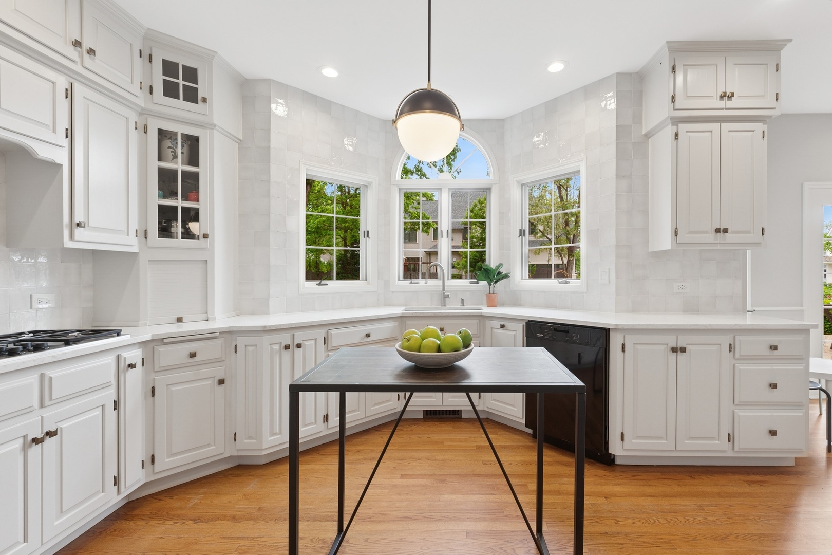 415 Fuller Road Hinsdale, IL 60521 - Photo 11 of 39 a kitchen with white cabinets and sink