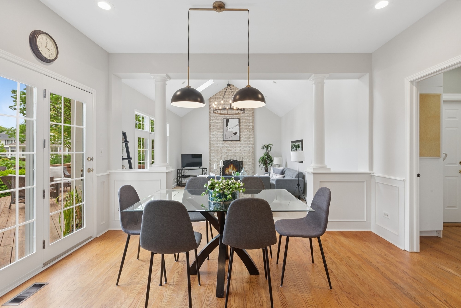 415 Fuller Road Hinsdale, IL 60521 - Photo 12 of 39 a view of a dining room with furniture window and wooden floor