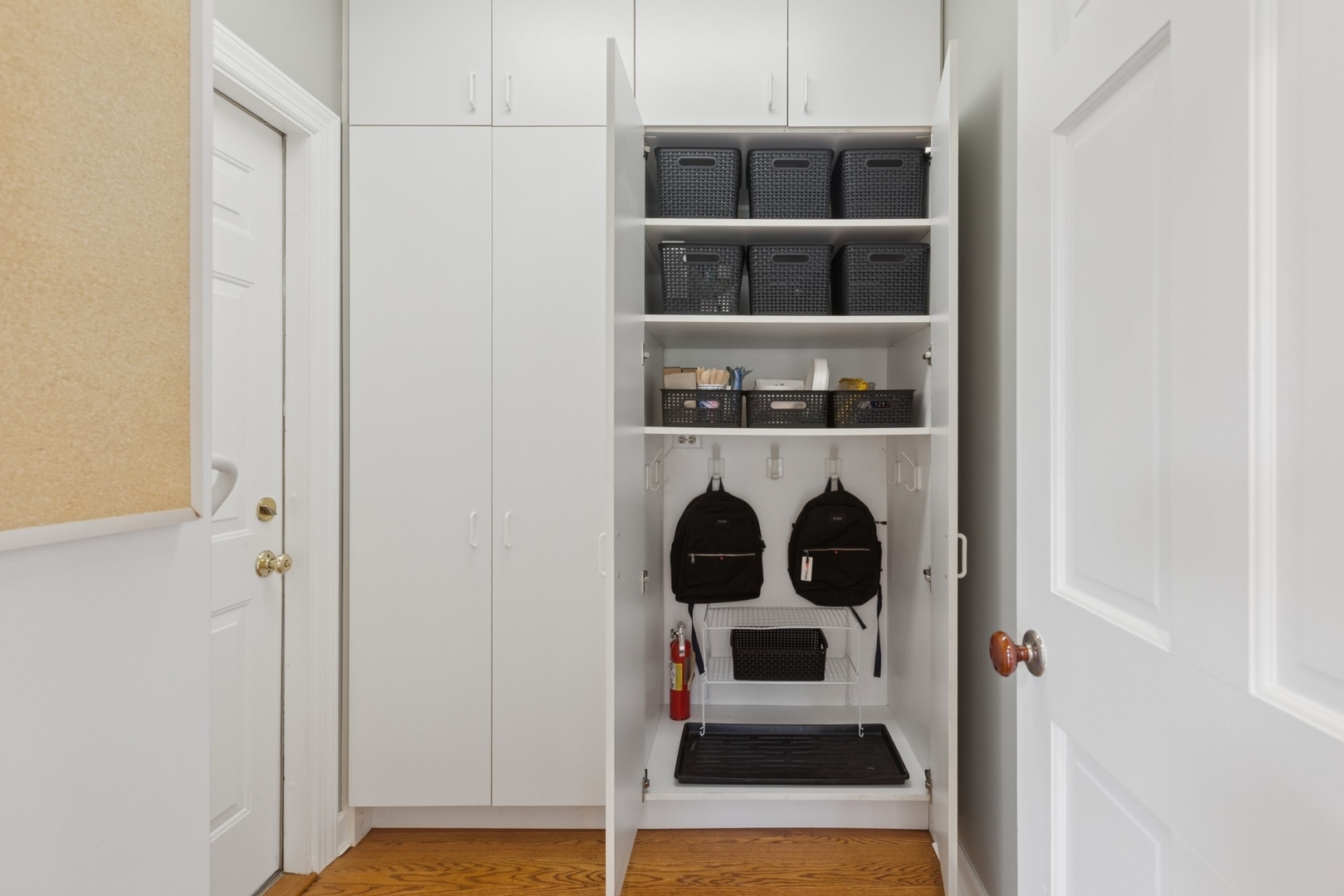 415 Fuller Road Hinsdale, IL 60521 - Photo 15 of 39 a view of walk in closet with clothes and shoes