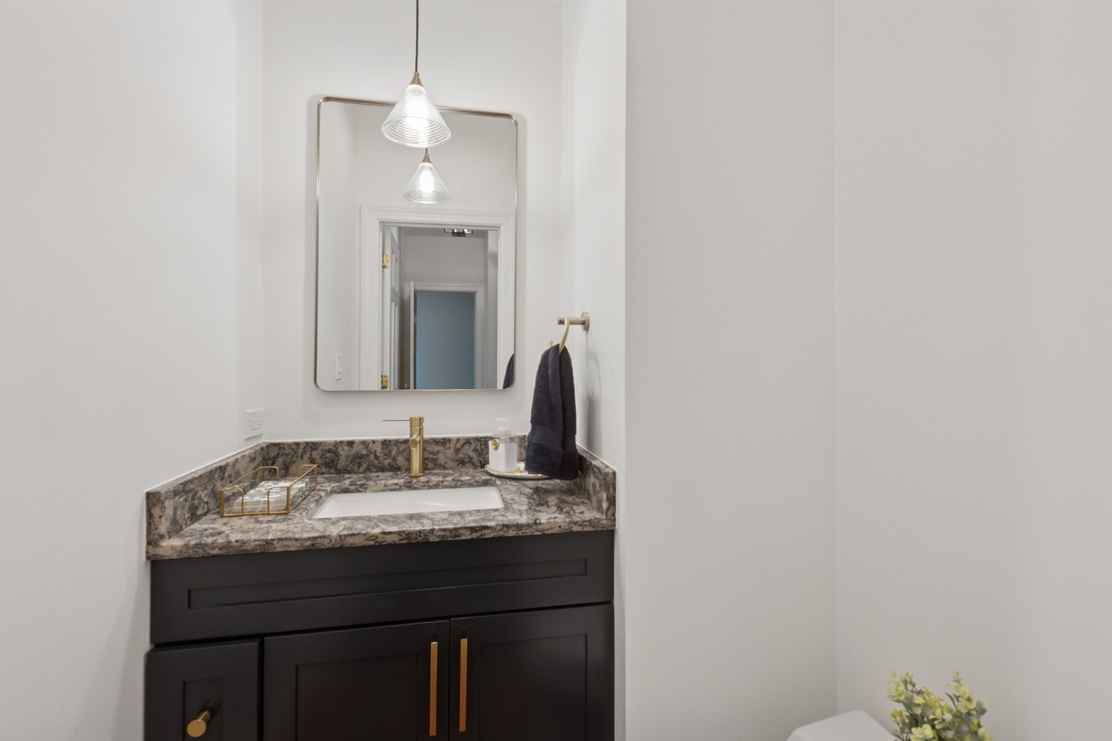 415 Fuller Road Hinsdale, IL 60521 - Photo 16 of 39 a bathroom with a granite countertop sink and a mirror