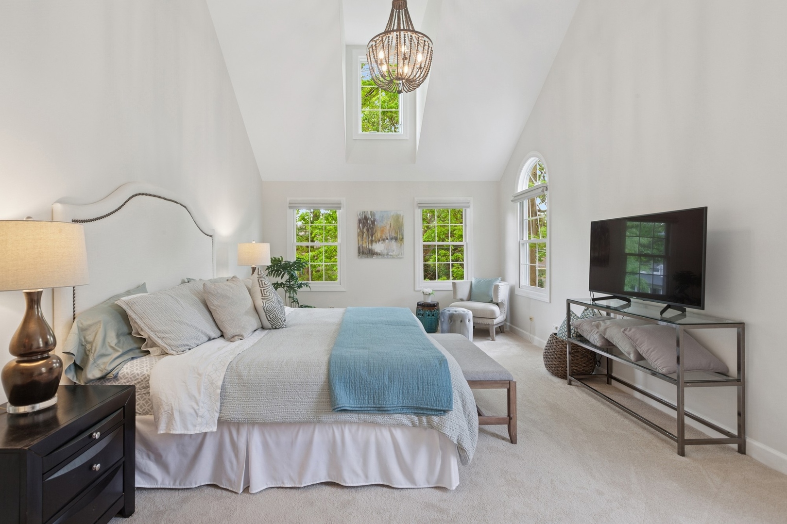 415 Fuller Road Hinsdale, IL 60521 - Photo 17 of 39 a bedroom with bed and a flat screen tv