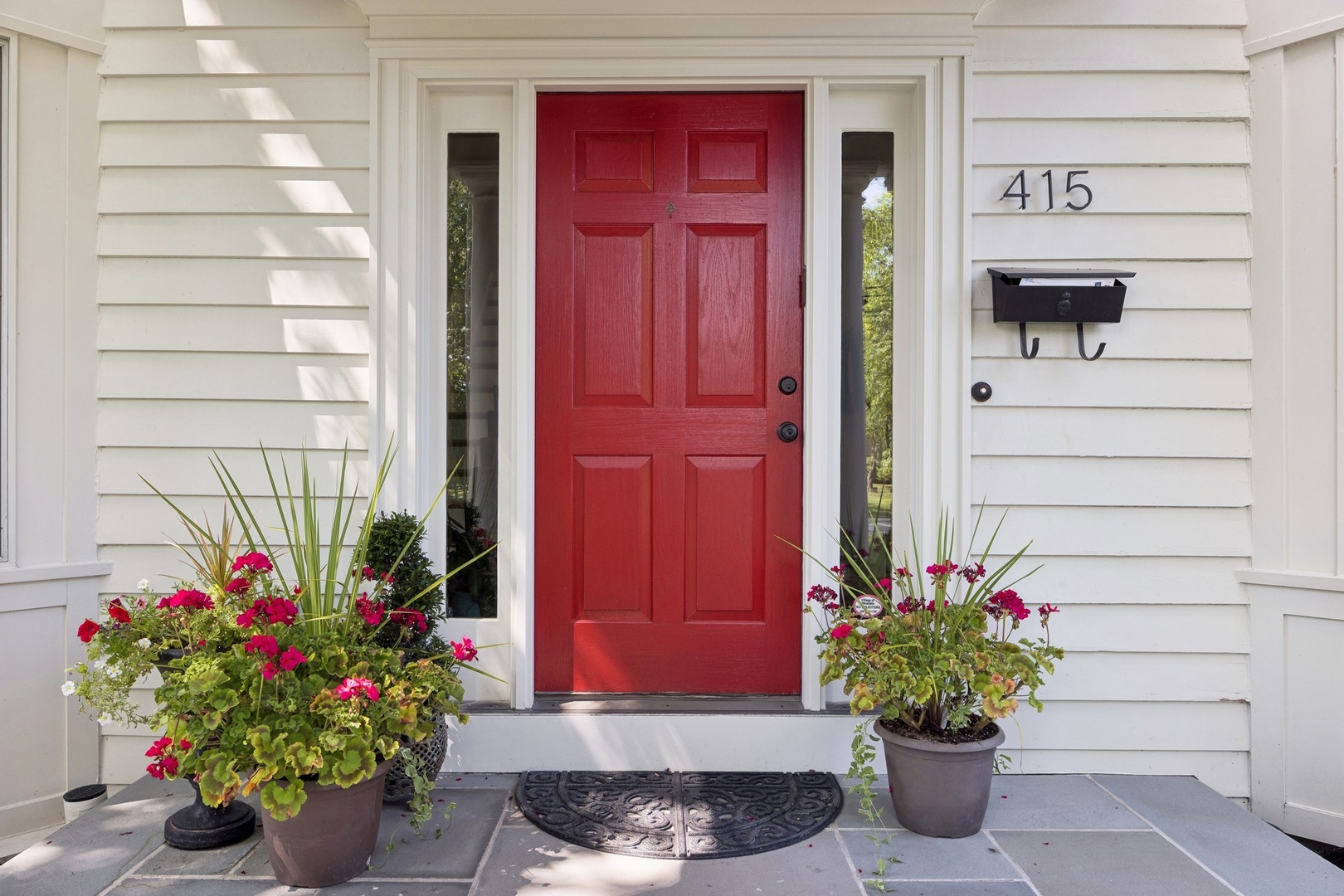 415 Fuller Road Hinsdale, IL 60521 - Photo 2 of 39 a house with a bench