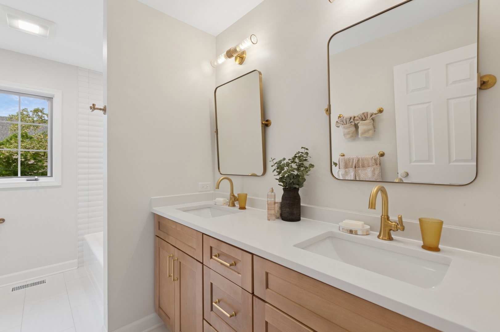 415 Fuller Road Hinsdale, IL 60521 - Photo 26 of 39 a bathroom with a sink and a mirror