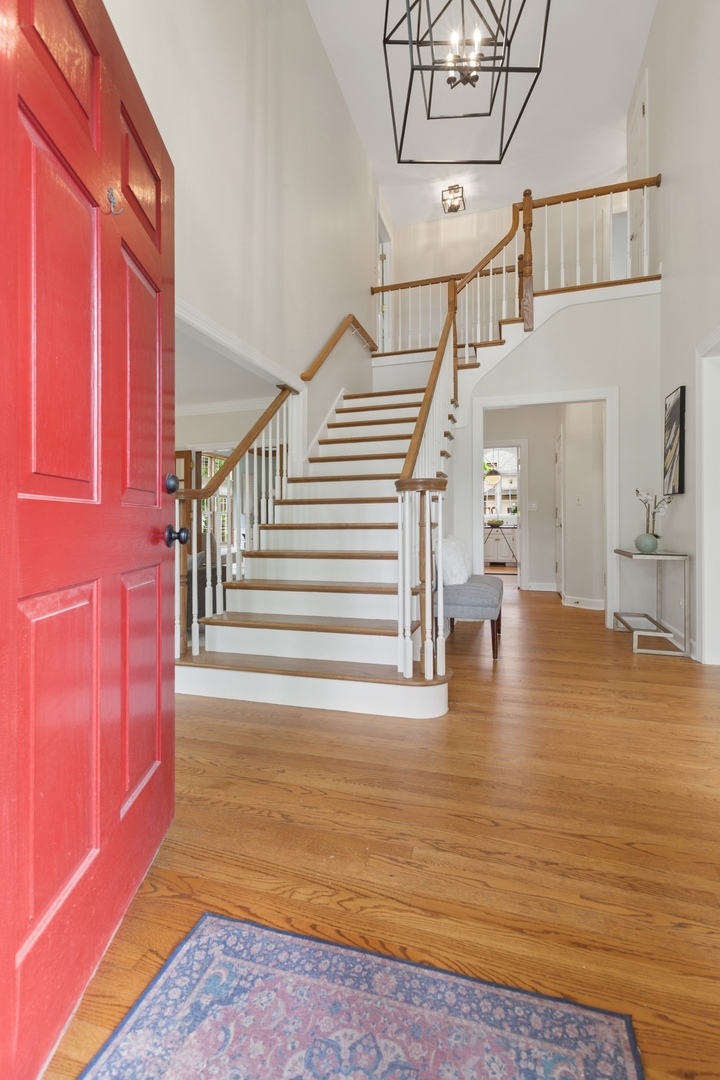 415 Fuller Road Hinsdale, IL 60521 - Photo 3 of 39 a view of entryway and hall with a wooden floor