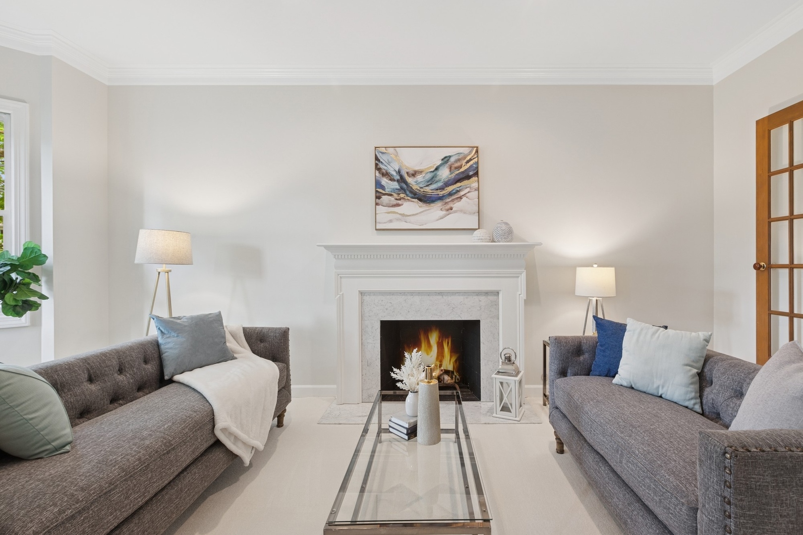 415 Fuller Road Hinsdale, IL 60521 - Photo 4 of 39 a living room with furniture and a fireplace