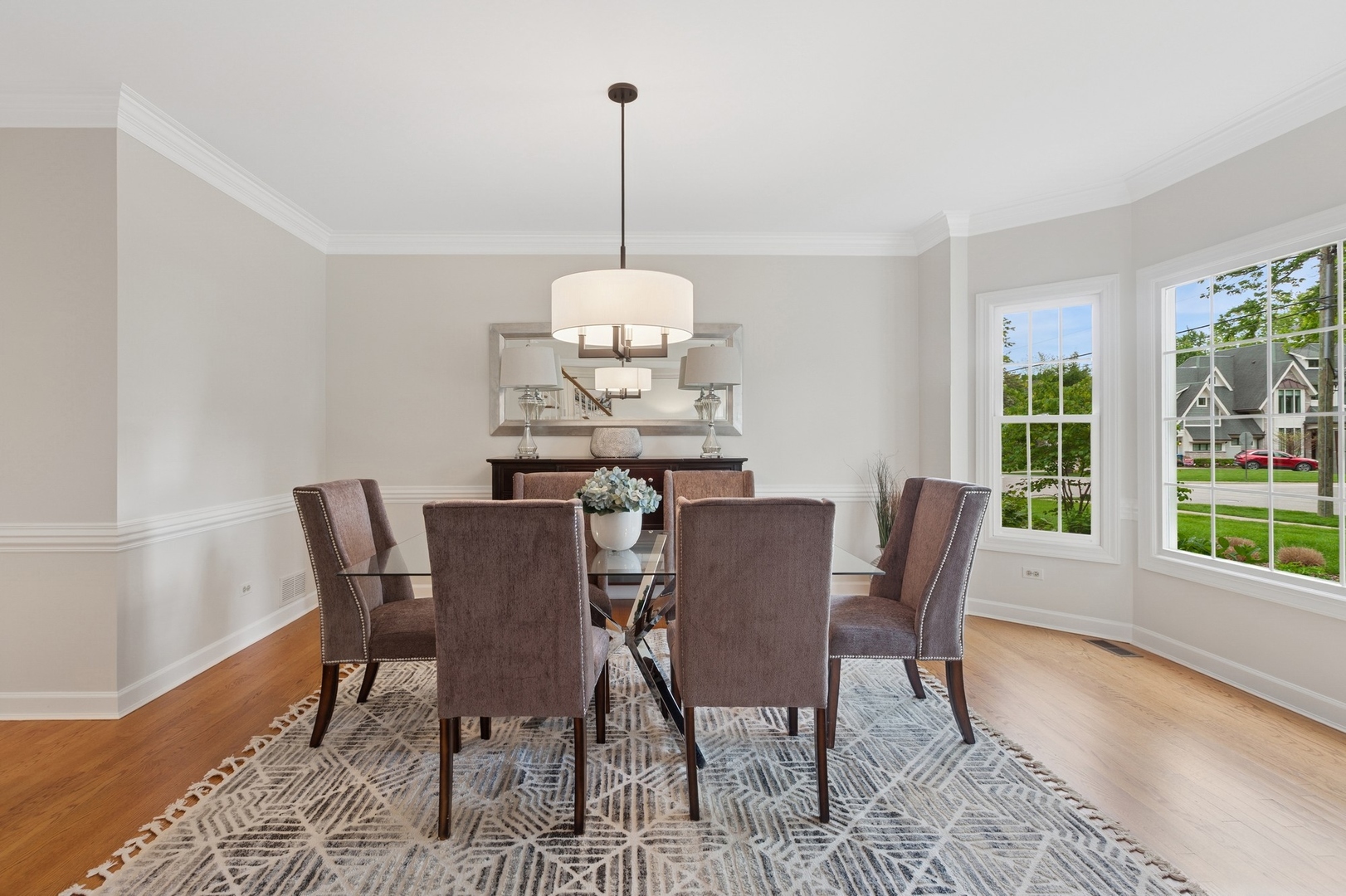 415 Fuller Road Hinsdale, IL 60521 - Photo 8 of 39 a view of a dining room with furniture window and wooden floor