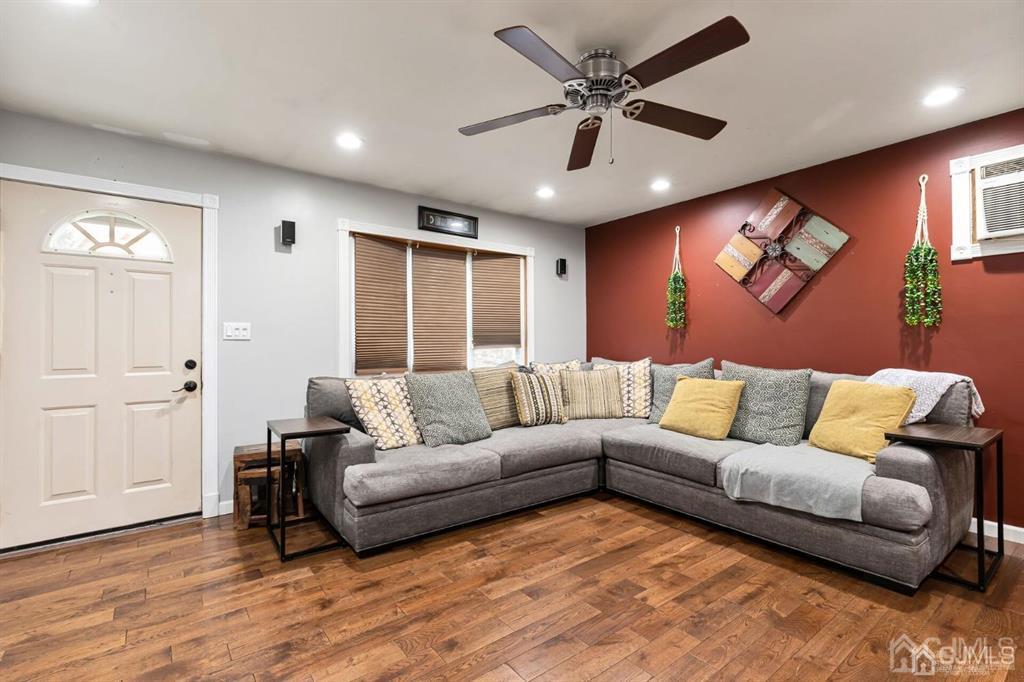 44 Ashley Road Edison, NJ 08817 - Photo 3 of 26 a living room with furniture and a ceiling fan