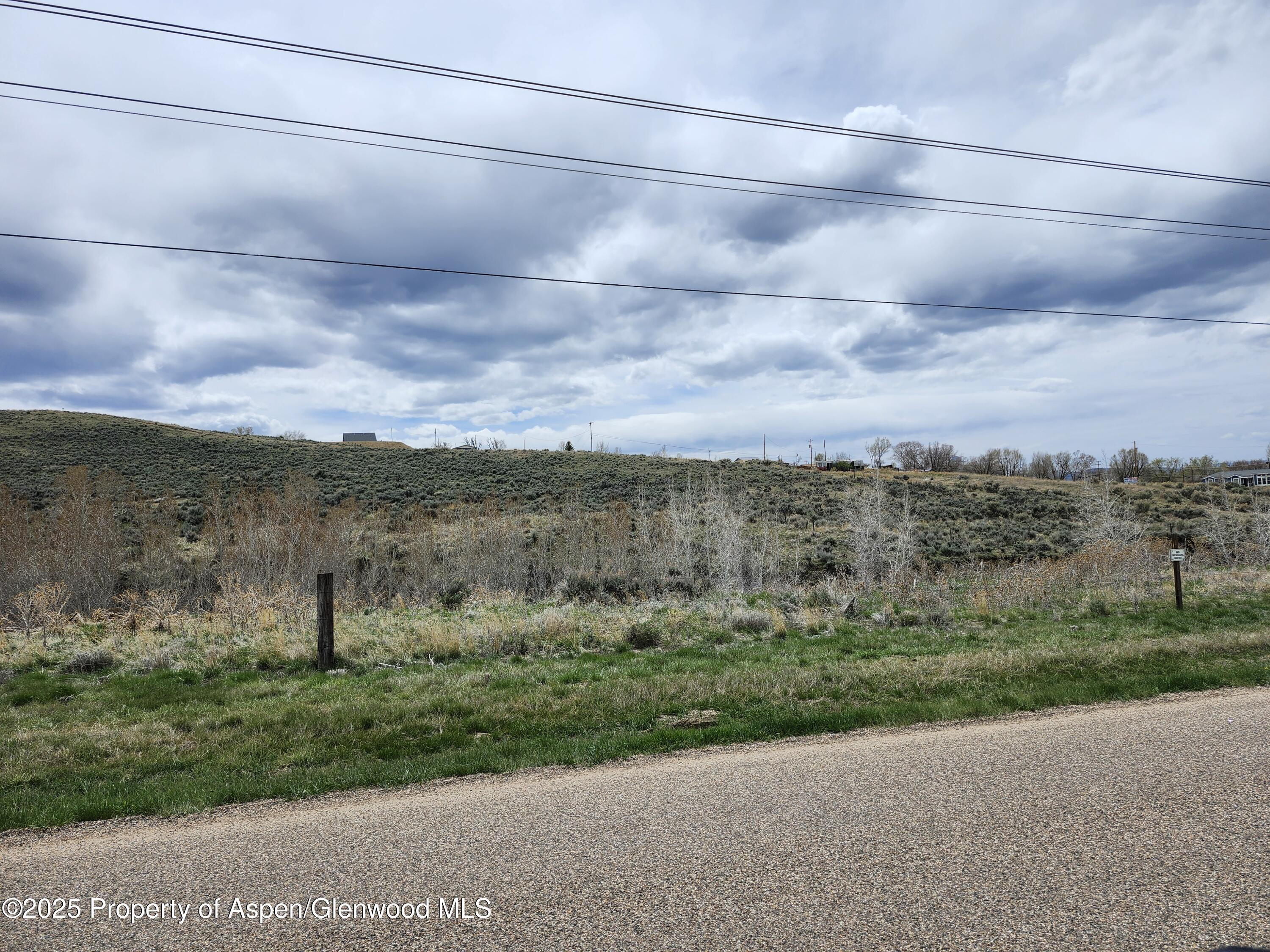 Tbd Pine Street, Unit 3739 Craig, CO 81625 - Photo 3 of 6 a view of a yard with an ocean view