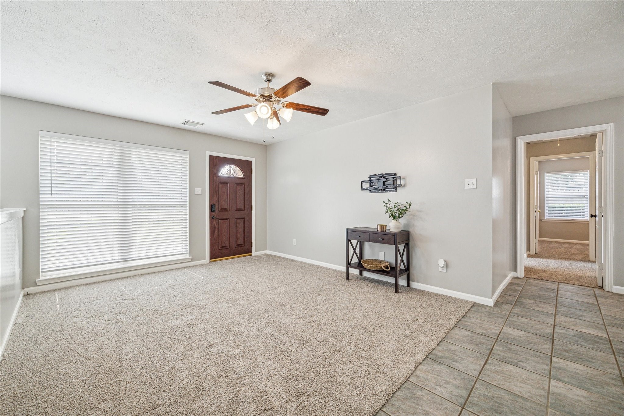 3613 Lazy Spring Drive Houston, TX 77080 - Photo 2 of 22 a living room with furniture and a window
