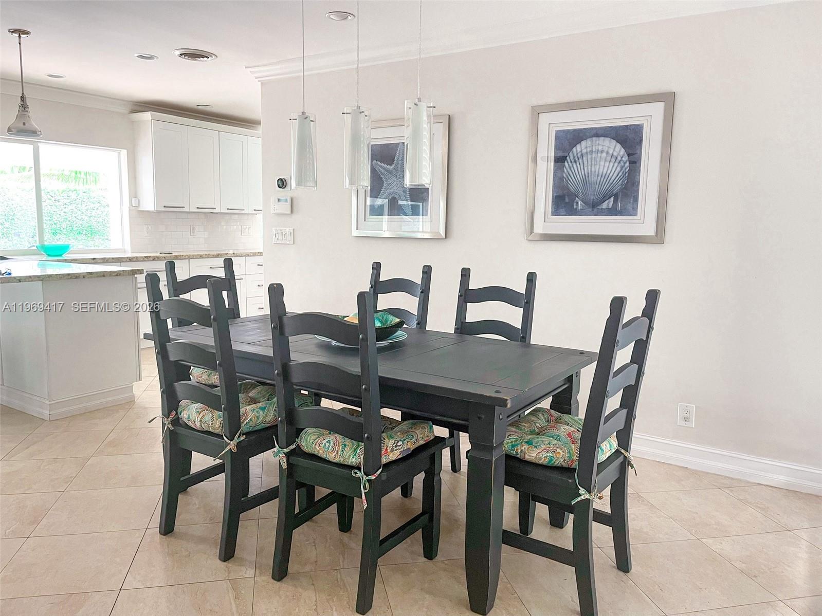 2932 Northeast 36th Street Lighthouse Point, FL 33064 - Photo 7 of 34 a view of a dining room with furniture