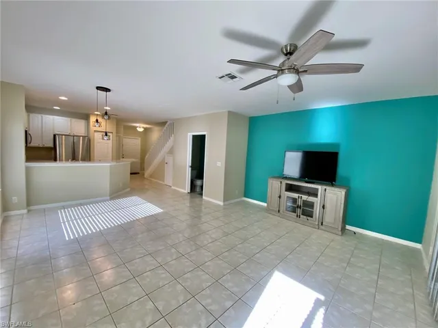 a view of a livingroom with a flat screen tv