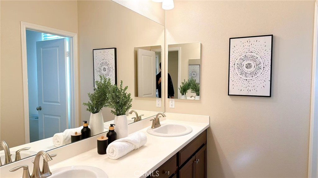 2029 Tracy Lane Alhambra, CA 91803 - Photo 15 of 25 a bathroom with a granite countertop sink and a mirror