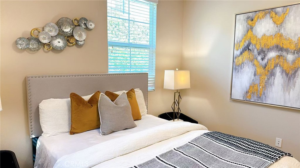 2029 Tracy Lane Alhambra, CA 91803 - Photo 17 of 25 a bedroom with a bed and a painting on the wall