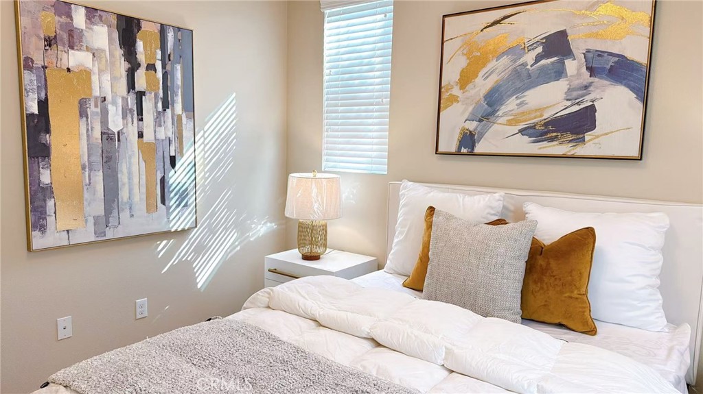 2029 Tracy Lane Alhambra, CA 91803 - Photo 19 of 25 a bedroom with a bed and a painting on the wall
