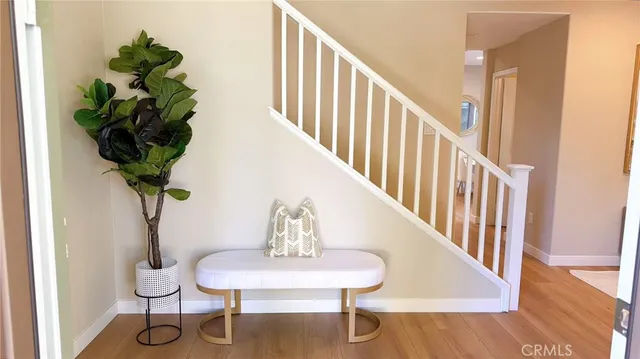 a view of entryway with wooden floor