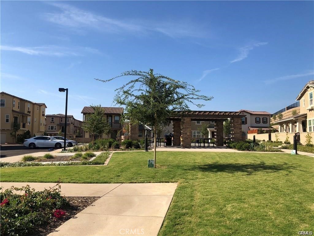 2029 Tracy Lane Alhambra, CA 91803 - Photo 21 of 25 a front view of a building with trees in the background