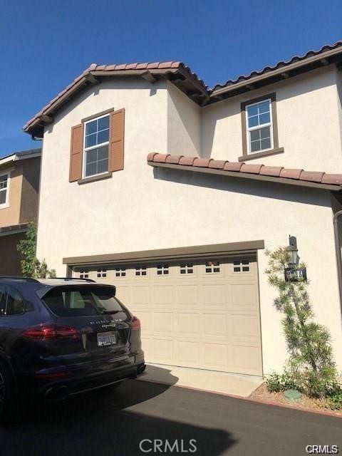2029 Tracy Lane Alhambra, CA 91803 - Photo 25 of 25 a front view of a house with parking space