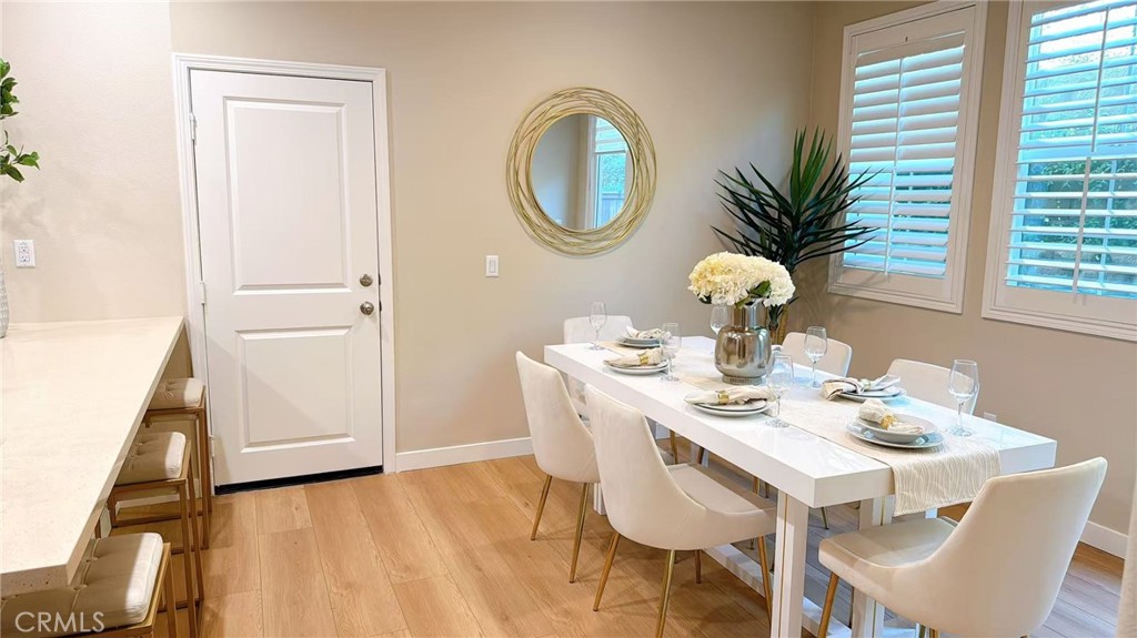 2029 Tracy Lane Alhambra, CA 91803 - Photo 4 of 25 a dining room with furniture and a potted plant
