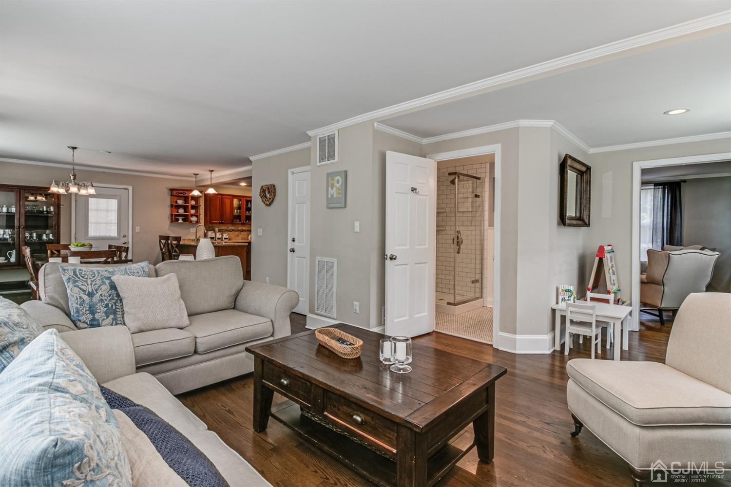 15 Edgewood Road Edison, NJ 08820 - Photo 14 of 35 a living room with furniture and a table