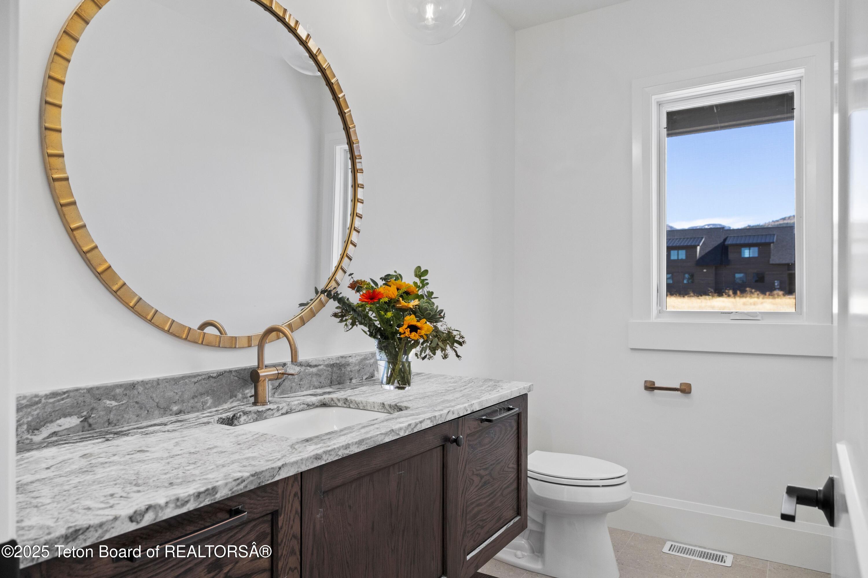 555 Silver Fox Lane Victor, ID 83455 - Photo 36 of 51 Staged Half Bath