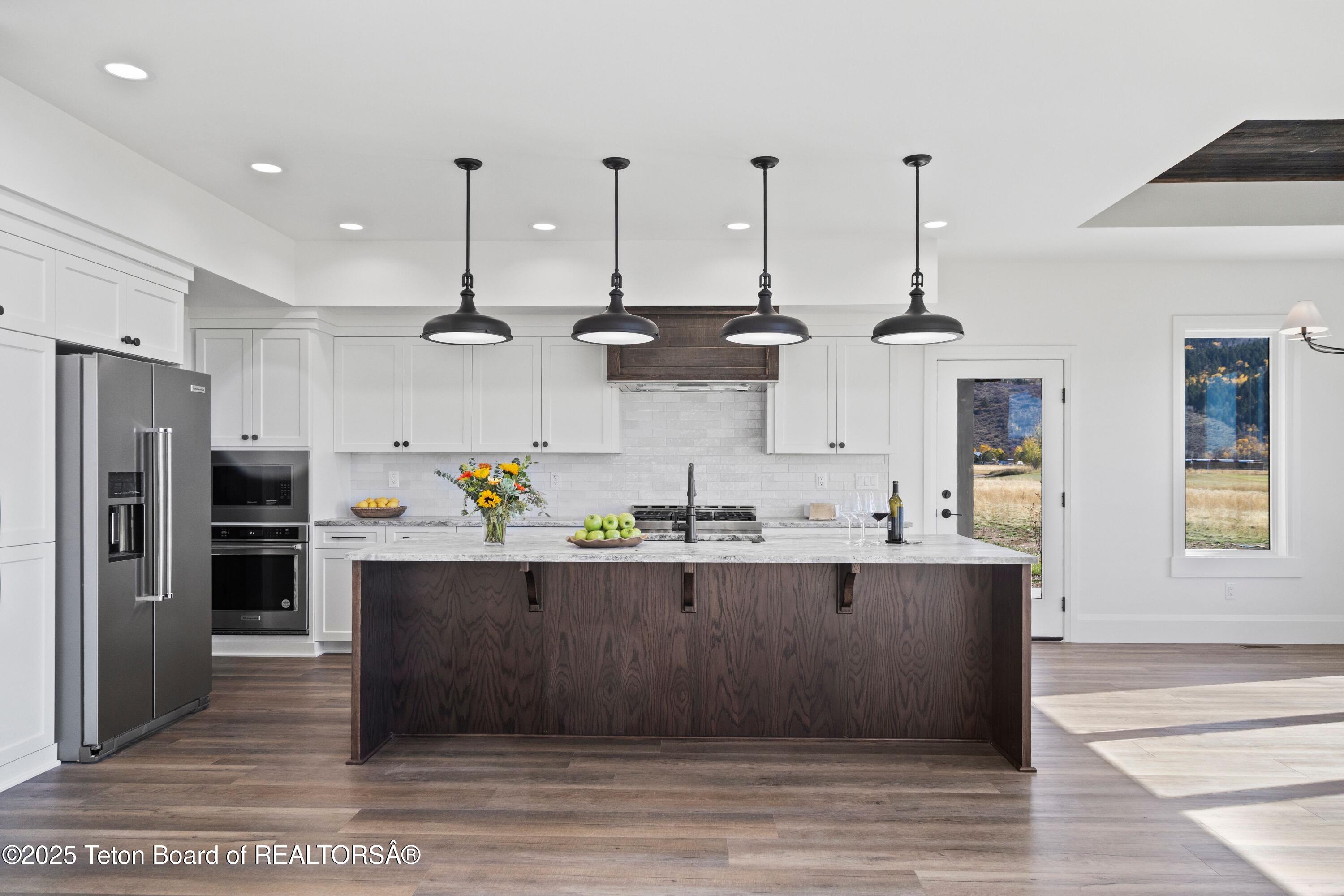 555 Silver Fox Lane Victor, ID 83455 - Photo 6 of 51 Staged Kitchen 2