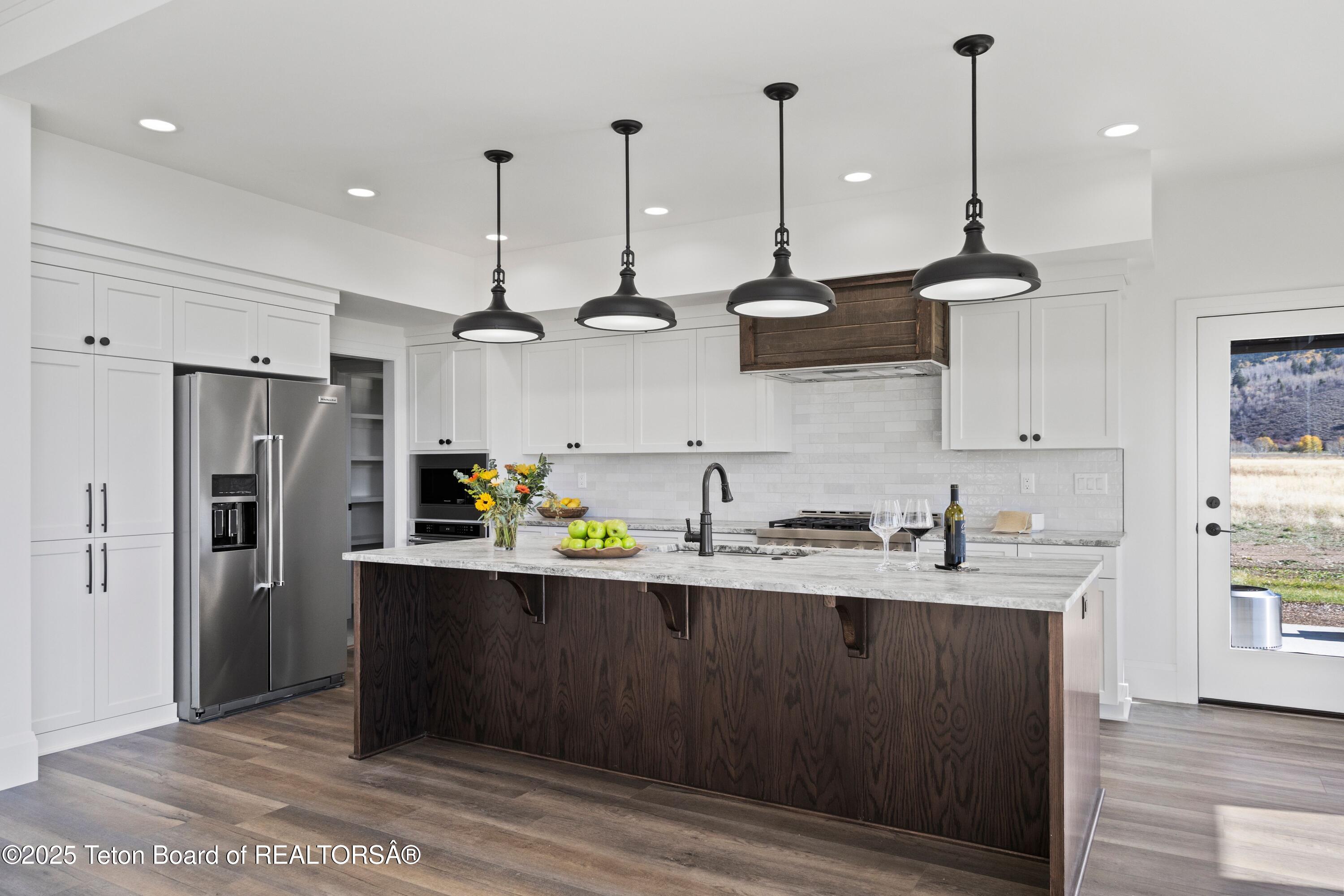 555 Silver Fox Lane Victor, ID 83455 - Photo 8 of 51 Staged Kitchen 3